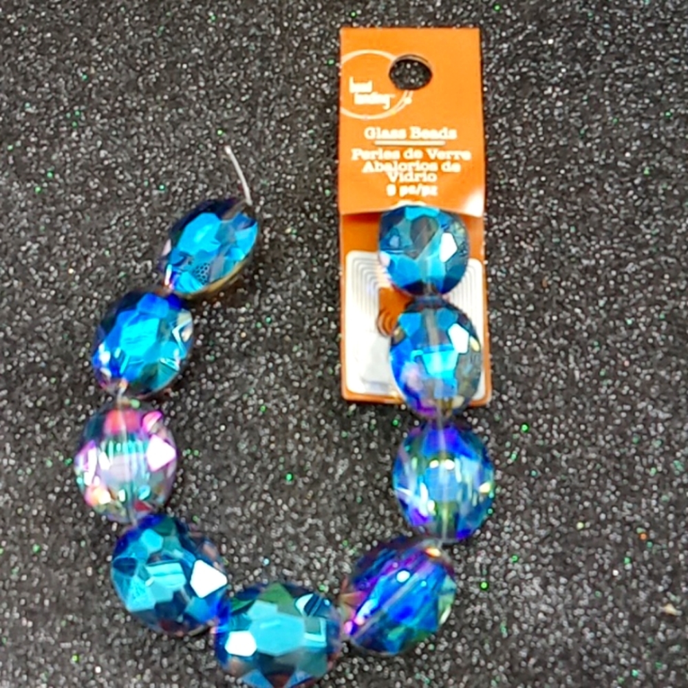 COPY - NWT  purplish blue iridescent  glass strung  beads